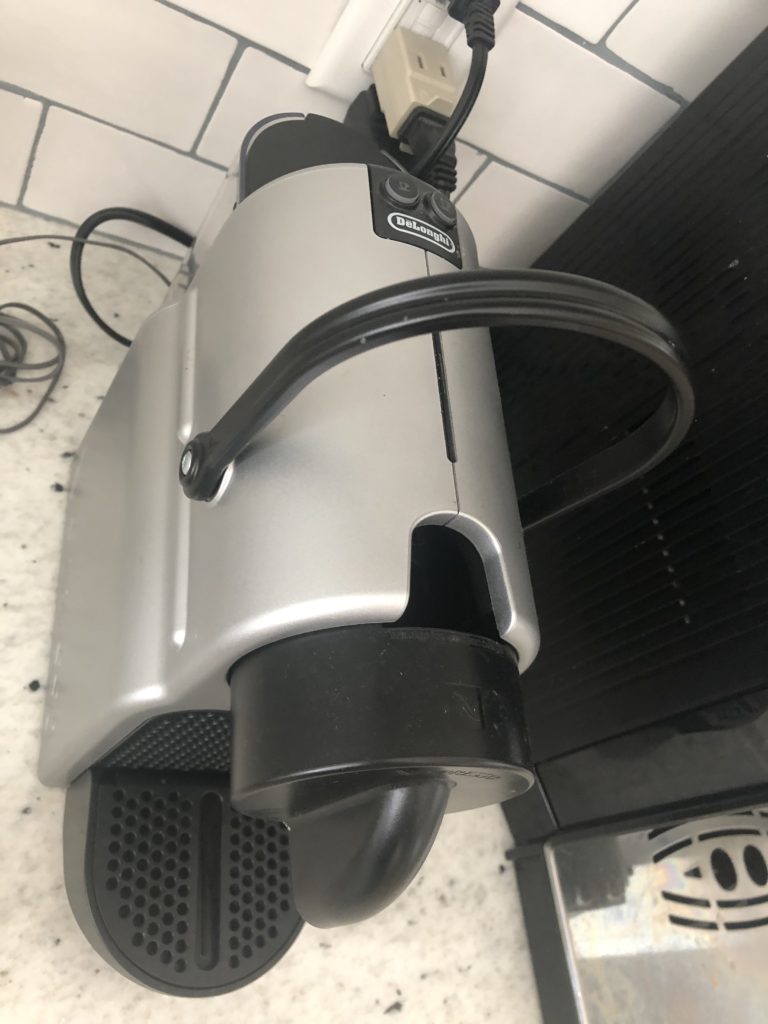 photo of broken espresso machine