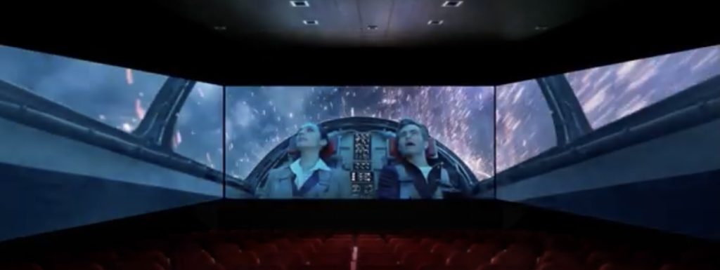 Scene from Wonder Woman 1984 where Diana and Joe are in the plane flying through the fireworks being shown on a ScreenX.