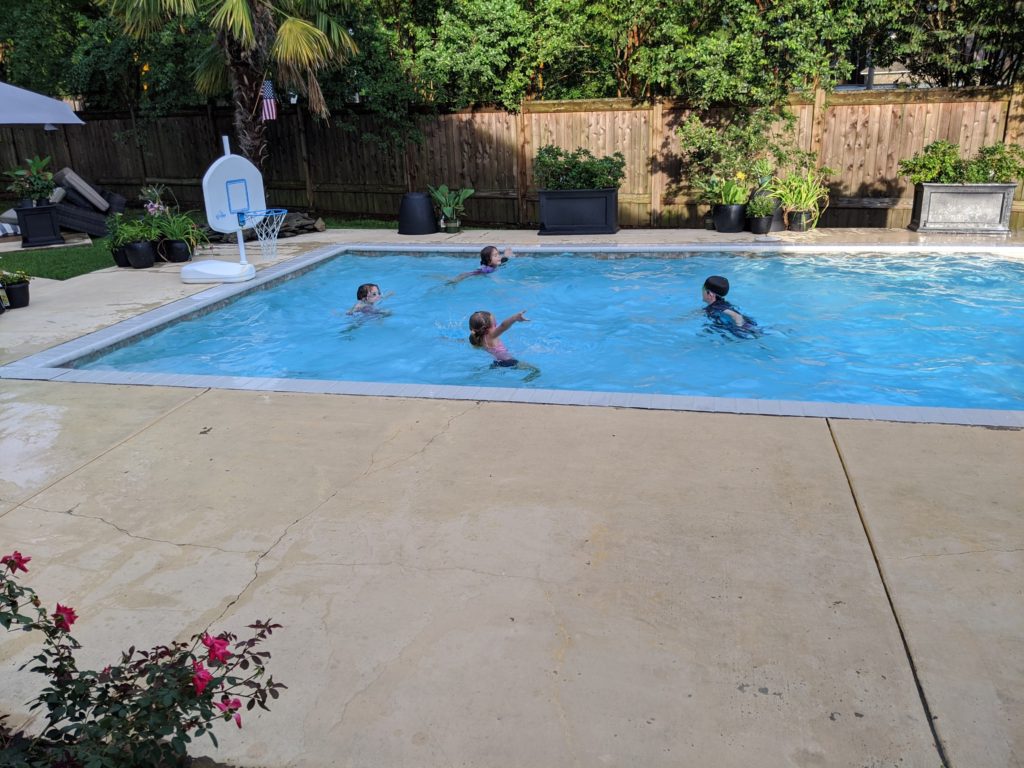 kids playing in a pool